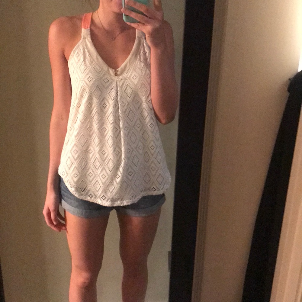 Razorback tank with light pink straps